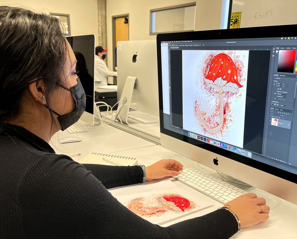 Student Working on a Graphic on the Computer